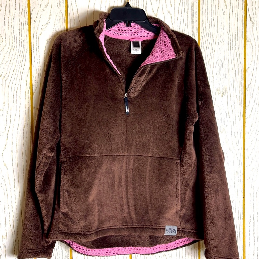 The North Face pull over.  Very soft and comfy, pink trail front packets